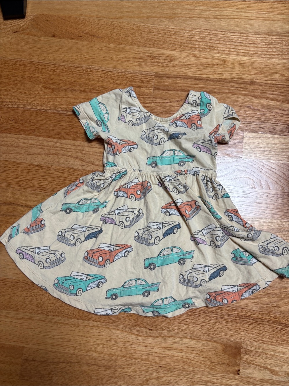 Tea Collection Cream Twirl Dress with Colorful Car Print